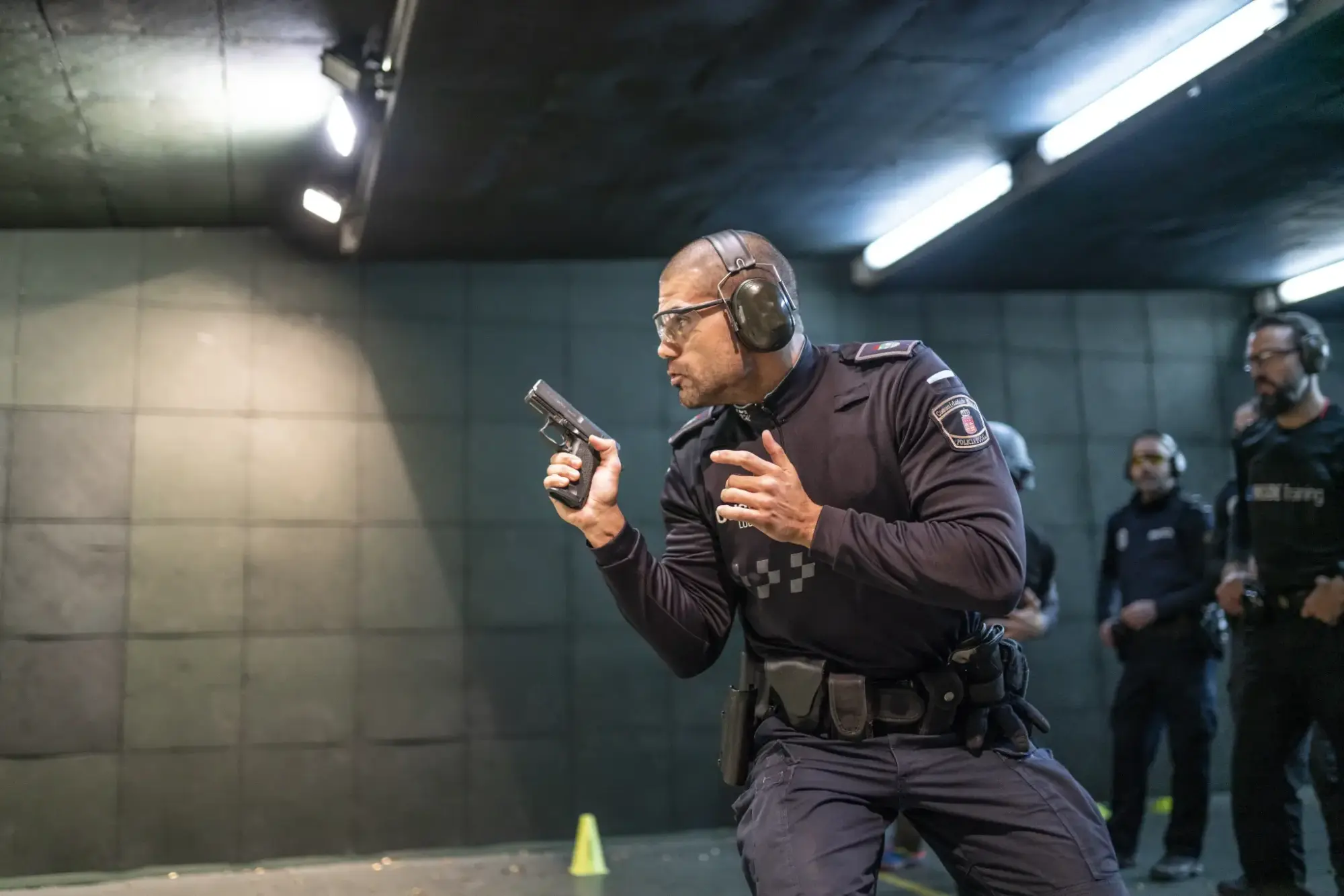 Police Training In Shooting Gallery With Short Weapon. Police training in shooting gallery with short weapon.