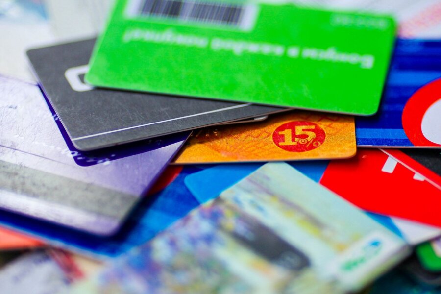 A pile of gift cards that a criminal is draining as part of an organized retail theft group.