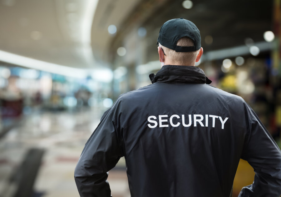Man in security jacket